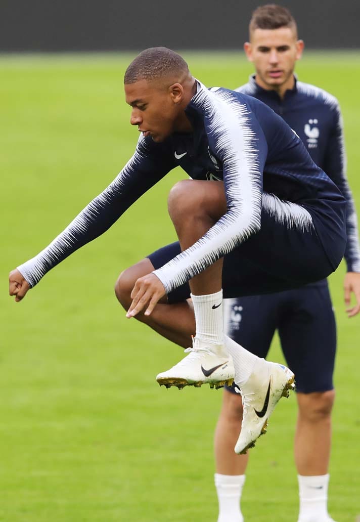 Nike white and clearance gold boots